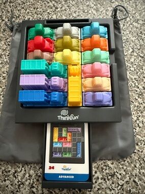 Thinkfun Sliding Traffic Brain-Teaser Puzzle with Multi-Color Vehicle Pieces